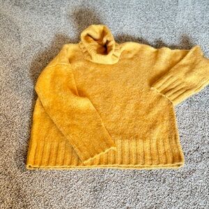 Warm, oversized, gold sweater. Size S.